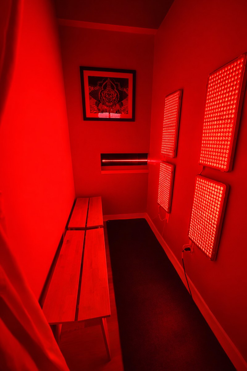 Red light therapy room with LED panels at Plunsana in St. Petersburg, FL